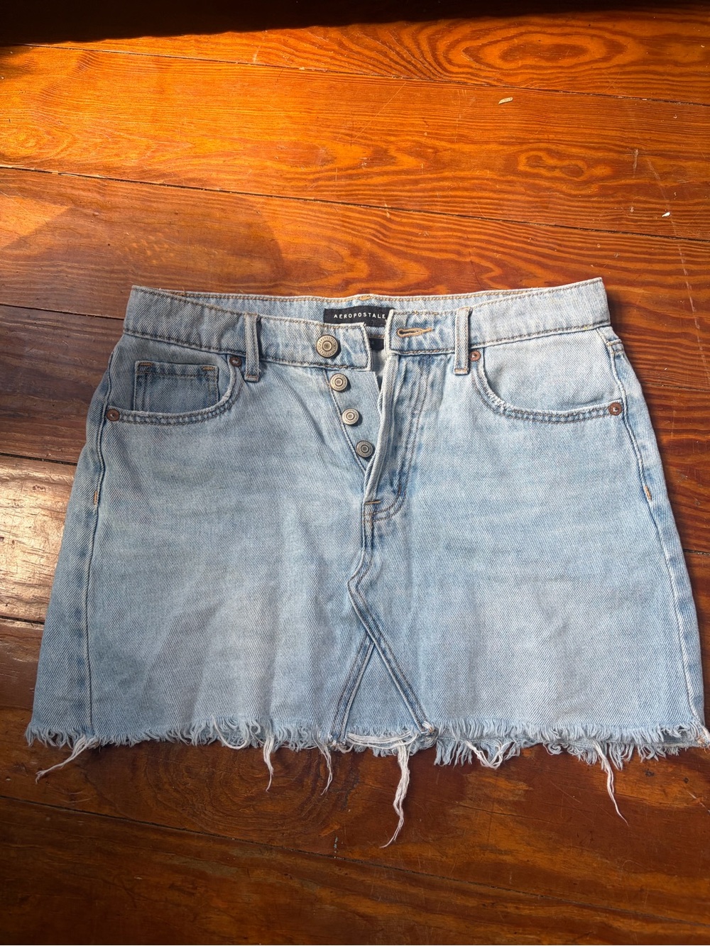 Aeropostale Light Wash Denim Mini Skirt with Frayed Hem